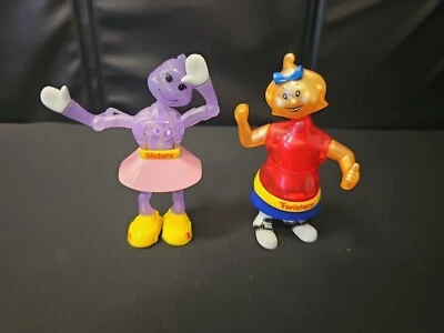 2 Noggin Bops Windup Toys Sliders Purple + Twisters Red  - Image 1 of 2