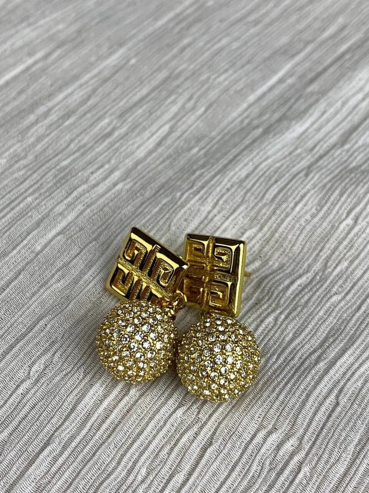 Pendientes colgantes de oro Givenchy con encanto Foto 1 de 4