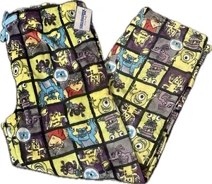 NEW DISNEY PIXAR MONSTERS INC FLEECE PAJAMA PANTS ADULTS UNISEX SZ L - XL - Picture 1 of 1