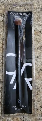 Cepillo iluminador de maquillaje rosa dorada  Foto 1 de 2