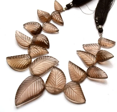 Piedras preciosas de cuarzo ahumado natural tamaño 16 a 33 mm cuentas talladas en forma de hoja hilo de 7" Foto 1 de 4