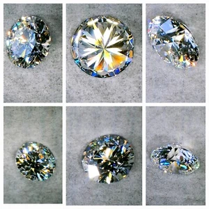 Diamante CVD taglio Tondo IGI LG645404739 CARAT 0.50 D VS1 5.13-5.17X3.11 mm - Foto 1 di 24