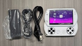 PSP GO PlayStation Portable White Game Console WITH STORAGE UPGRADE AND MORE