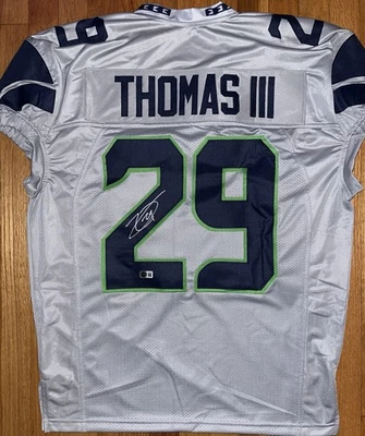 Camiseta deportiva firmada por Earl Thomas personalizada de los Seattle Seahawks corte de juego certificado de autenticidad de Beckett Testigo Foto 1 de 2