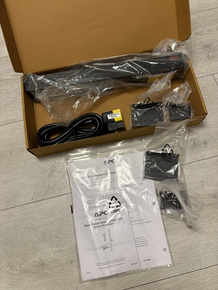 New APC AP9565 IEC C13 12 Gang Power Distribution Unit 1U Horizontal 16A - Image 1 of 4