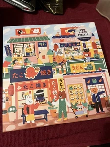 Mudpuppy Open for Business 500 Pc+  2additional  500pc Puzzles - Picture 1 of 6