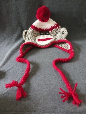 Calcetín de ganchillo hecho a mano para niños sombrero de mono con orejeras y trenzas Foto 1 de 4