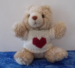 Cute Little Tan Teddy Bear with Knit Sweater with Heart from Teleflora - Picture 1 of 5