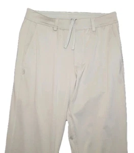 Pantalone pendolare Rhone uomo piccolo beige panna performance golf elasticizzato - Foto 1 di 6