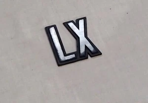 Nissan Bluebird LX Plastic Badge Emblem Genuine - Bild 1 von 3