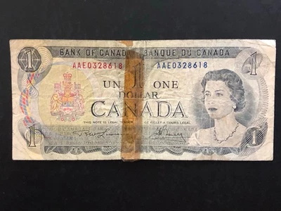 Billete de un dólar de Canadá 1973 moneda - circulado y mal estado Foto 1 de 2