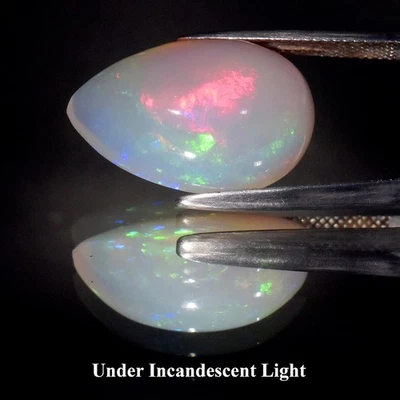 💎 13.07ct Pear Cabochon Natural White Opal - Lustrous Color Play, Ethiopia Gem - Image 1 of 4