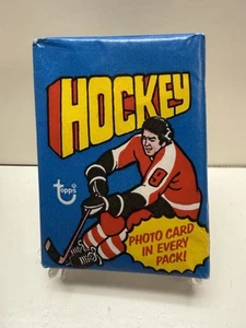 Paquete de cera Topps Hockey 1976 - Posible Brian Trottier RC, Bobby Orr, Clarke ect. - Imagen 1 de 2