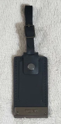 New Tumi Black Leather/Stainless Steel Luggage Name Tag with Adjustable Buckle - Image 1 of 4