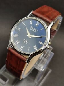 Vintage Seiko Slim Quartz Wrist Watch Silver Japan Made Roman Blue Dial