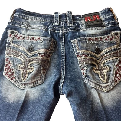 Pantalones de mezclilla de diseñador Rock Revival para hombre Gus rectos bolsillos adornados azul 34 Foto 1 de 4