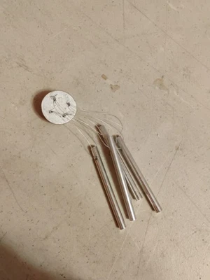 Carillón de viento de metal Foto 1 de 2