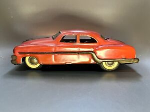 Vintage 1950s Pontiac Minister Delux tin friction toy car