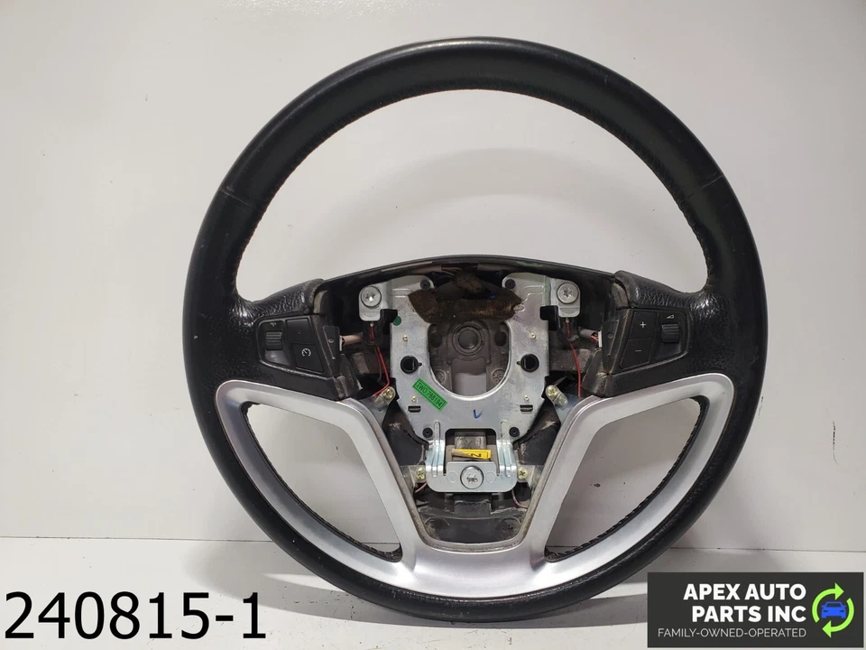 Volante Saturn Vue 2008 3,6 L negro y plateado fabricante de equipos originales con controles Foto 1 de 4