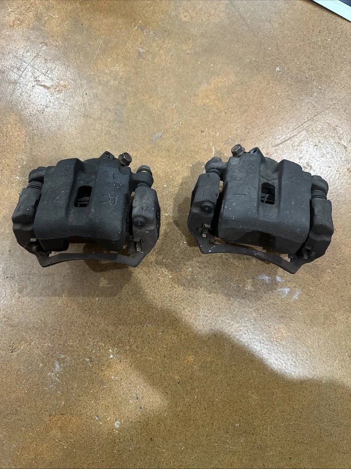 1994-1997 Mazda Miata Oem Front Brake Calipers W/ Brackets - Image 1 of 4