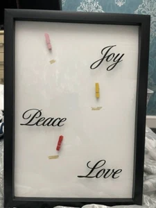Novelty Picture Frame with pegs to hold pictures. Used once - Picture 1 of 2