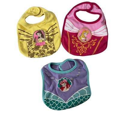 Juego Babero Bebé Princesa Disney - Princesa Ariel, Aurora y Bella Foto 1 de 4