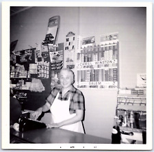 Vintage Found Photo - Woman Smiles While Working At Store With Camel Cigarettes