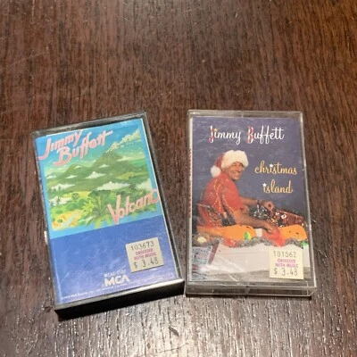 Jimmy Buffet Volcano & Christmas Island Cassette Tapes Lot MCA - Image 1 of 3
