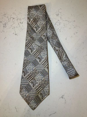 Corbata ancha Brittania para hombre vintage años 60 70 tonos tierra, azul y blanco. Foto 1 de 4