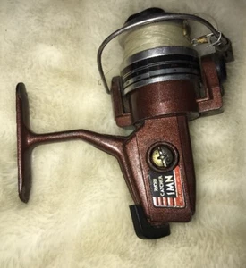 Vintage Ryobi Catcher 1MN Spinning Reel Gear Ratio 4.75:1 Brown Metal Aluminum! - Picture 1 of 9