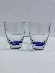 Two weighted Ciroc vodka glasses.