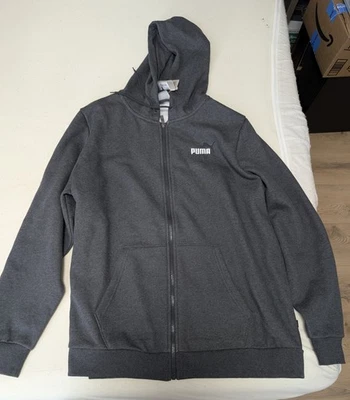 SUDADERA CON CAPUCHA PUMA FZ CREMALLERA 2XL GRIS OSCURO JASPEADO. NUEVO.  LOGO PUMA BLANCO. Precio de venta sugerido por el fabricante $55 Foto 1 de 4