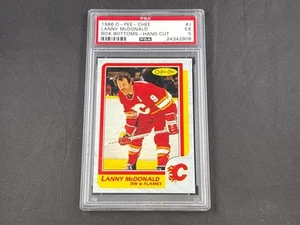 1986-87 O-PEE-CHEE HOCKEY LANNY MCDONALD #J CAJA FONDOS LLAMAS CORTADAS A MANO PSA 5 EX - Imagen 1 de 2