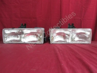 Новая из старых запасов оригинальная пара фар головного света для Cadillac Deville FWD 1987–1990 годов выпуска - Изображение 1 из 4