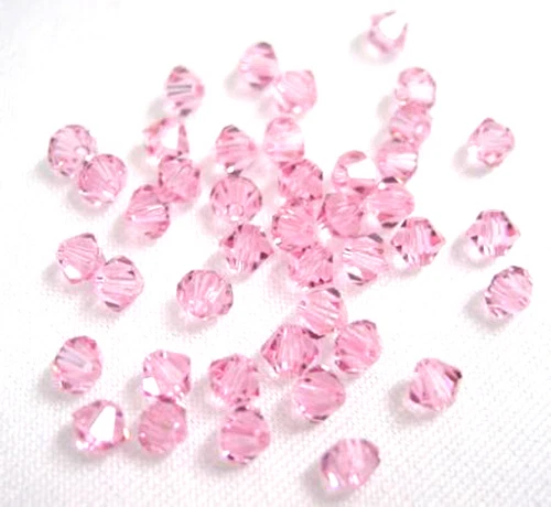 24 LT ROSE SWAROVSKI CRYSTAL # 5301 BICONE BEADS 4MM - Image 1 of 1