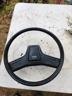 Volante Jeep Comanche MJ Cherokee XJ 84-96 2 radios negro OEM Foto 1 de 2