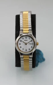Seiko Women Watch Silver Gold Stainless St Stretch WR Batt Day Date White Quartz - Picture 1 of 6