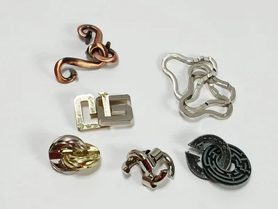 Lot of 6 Hanayama Metal Brain Teaser Puzzles = Moderate to Hard skill levels - Image 1 of 4