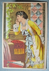 1880's era Reynolds Bros. Shoes, Utica, N.Y. Trade Card - Lady in Pretty Gown - Picture 1 of 2