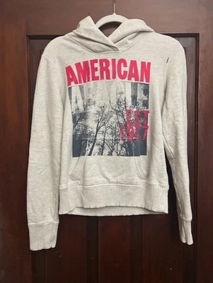 Sudadera con capucha para mujer American Eagle rosa crema estampado gráfico talla mediana Foto 1 de 3