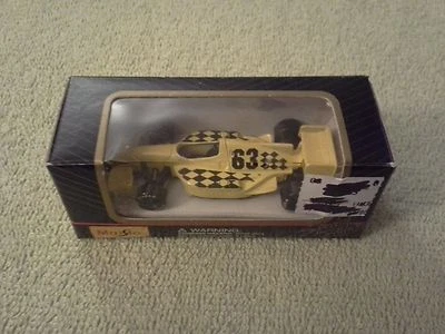 2000's Maisto Special Edition Yellow  IndyCar #63  1/64 Limited Diecast - Image 1 of 4