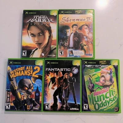 Lote de cinco juegos originales de Xbox - Oddworld, Tomb Raider, Shenmue II, Destroy, etc. Foto 1 de 4