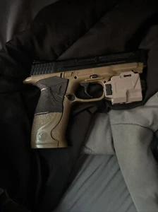 Smith & Wesson Mp 40 W/green Beam .177 Cal Co2 Pistol - Picture 1 of 6