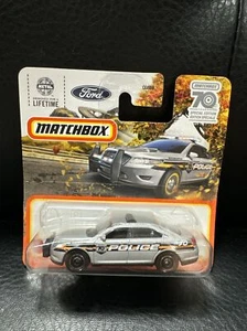 2023 Matchbox #23 Ford Police Interceptor SILVER METALLIC | 70 YEARS Short Card - Picture 1 of 2