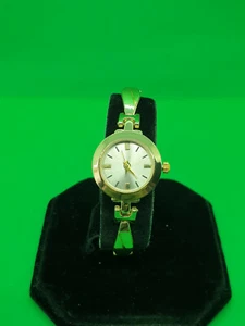 ladies gold tonebracelet dress watch,silver face,gold hands,unbranded name.#111. - Picture 1 of 8