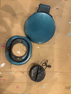 1991-1994 Mercury Capri Fuel Gas Flap Door Assembly - Image 1 of 4