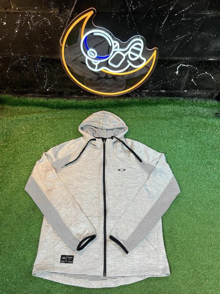 Sudadera con Capucha Oakley Cremallera Completa a Rayas para Hombres Talla Md Calce Regular Ligera Foto 1 de 4