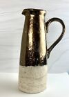 Gold Paint Clay Art pottery pitcher.  Applied Gold Handle.  Clay Base With Gold
