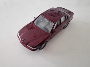SIKU 1052 BMW 730 IL WEINROTMET. E38 B6 MINT - Bild 1 von 3