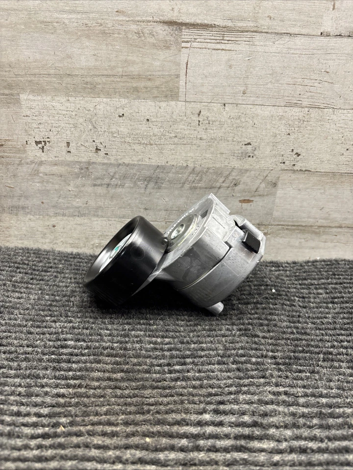 Tensor de correa Ford OEM F5DE-6B209-DA para Ford Taurus 1996-2000 Foto 1 de 4